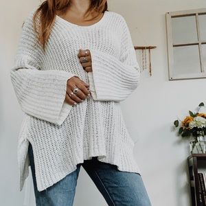 White V neck sweater with flare sleeves
